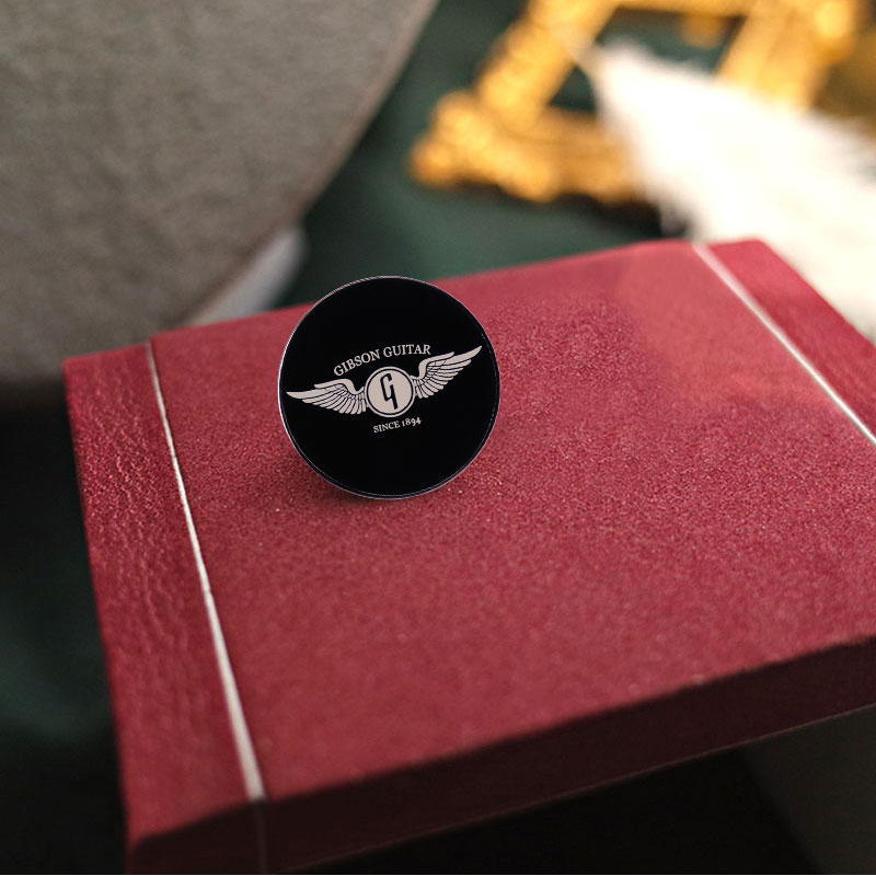 Gibson Guitar Wing Enamel Pin  - огляд і ціна Musical Instrument Logo